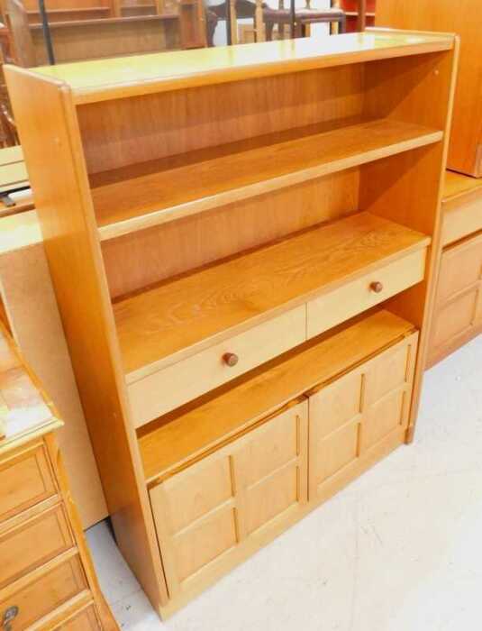 A Nathan teak open cabinet, with double doors beneath.