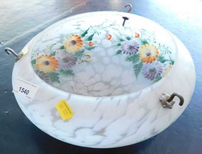 A frosted glass hanging shade.