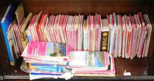 Various Ordnance survey maps, pink covers, etc., a large quantity of other travel books, maps,...