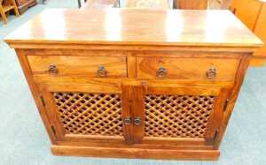 A Jig style side cabinet, with two frieze drawers above a pair of meshwork fronted cupboards.