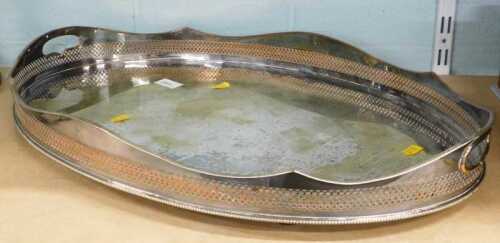 A galleried edge silver plated tray. (AF)