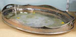 A galleried edge silver plated tray. (AF)