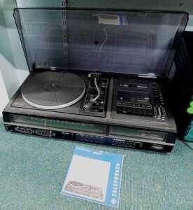 A Telefunken Studio Centre 5030 hi-fi music system, with Dolby system turntable and Perspex cover.