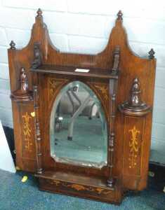 A rosewood overmantel mirror of small proportion.
