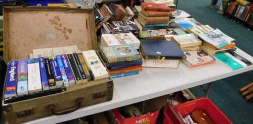 Various books, fiction and non-fiction, travel, a case containing books on Bolivia, etc., Stalin,...