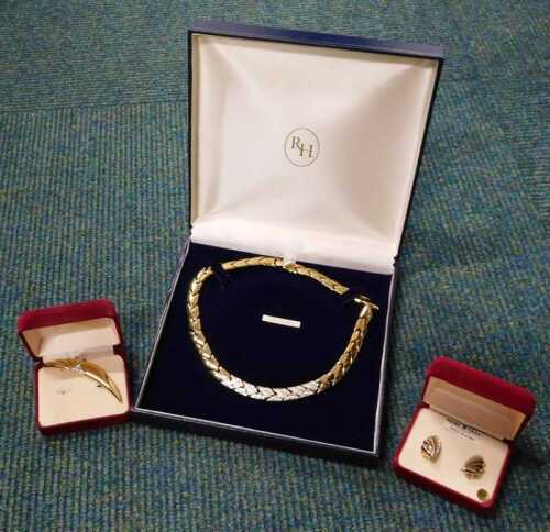 Costume jewellery, to include a pair of gold plated earrings, brooch, and necklace.