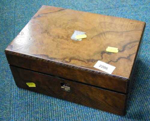 A Victorian walnut jewellery box of rectangular form.