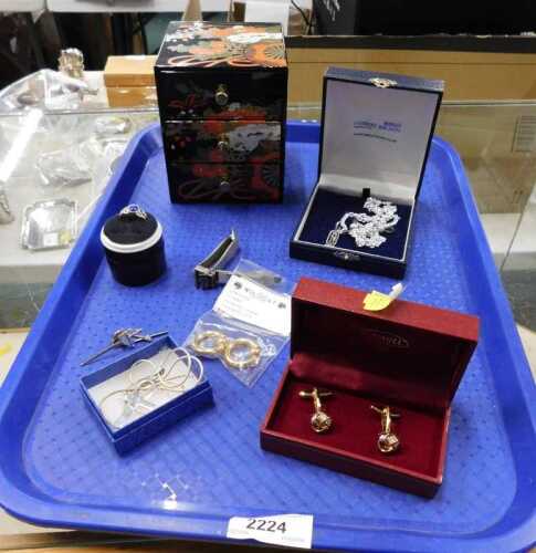 A group of costume jewellery, comprising gold plated hoop earrings, silver pendant and chain,...