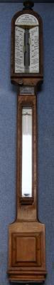 *A 19thC oak cased barometer by Negretti & Zambra
