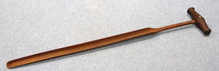 *A cast metal spit to take samples