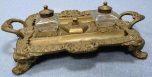 *A large Rococo brass double inkwell