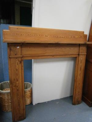 A Victorian pitch pine fire surround