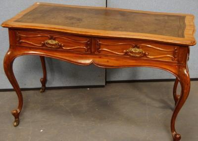 A 19thC continental walnut bureau plat