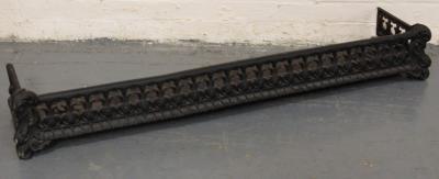 *A cast iron fire fender