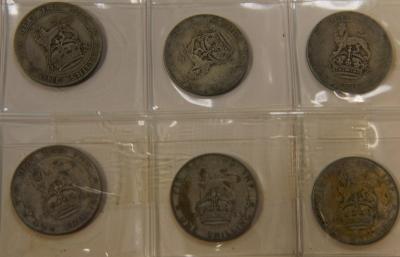 An album of pre-decimal coinage
