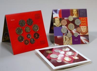 Nine Great British and Northern Irish proof coin sets