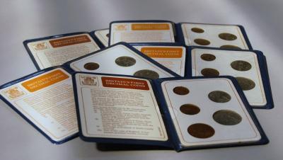 Thirteen Great British and Northern Irish proof coin sets