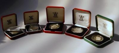 Five Royal Mint commemorative coins