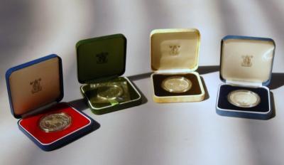 Four Royal Mint commemorative coins