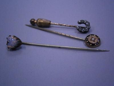 Three stick pins