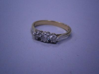 A three stone diamond ring