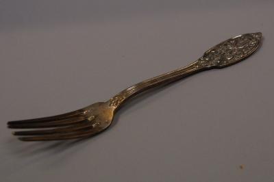 A Continental silver table fork.