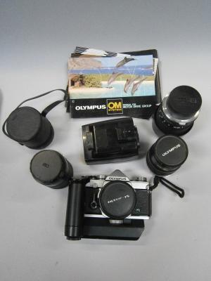 An Olympus OM-1 SLR camera