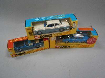 Three boxed Corgi toys