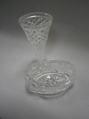 Cut crystal flared vase and boat shaped bowl. (2)