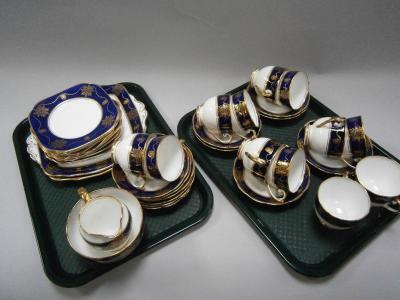 A Roslyn china blue and gilt tea service.