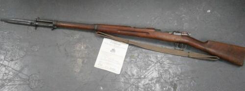 A Mauser 6.5mm rifle with bayonet