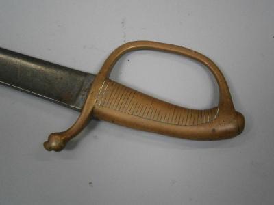 A 19thC brass handled sabre.