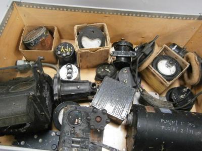 A box of air ministry instruments including a gun sight