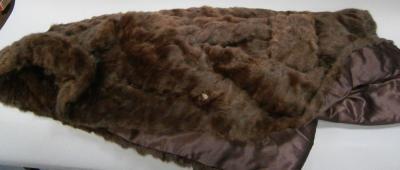 A ladies fur coat.