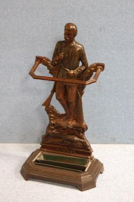 A late Victorian anodised stick stand with a figure of Henry Stanley