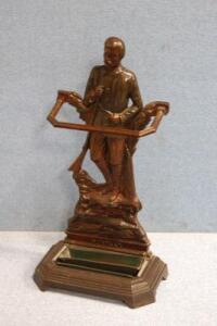 A late Victorian anodised stick stand with a figure of Henry Stanley