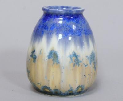 A small dip glazed vase by Ruskin