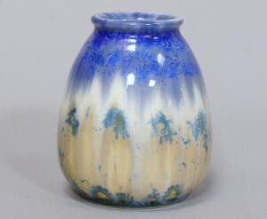 A small dip glazed vase by Ruskin