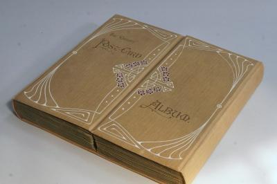 A double opening postcard album containing topagraphical cards particularly of Peterborough Cathedra