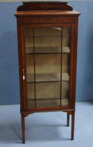An Edwardian painted mahogany china cabinet