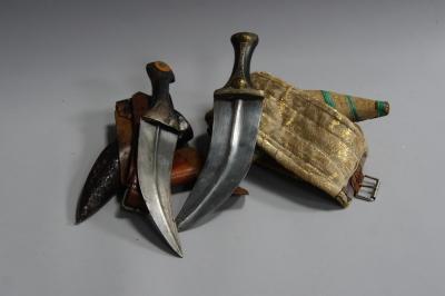 Two small Arabic daggers.