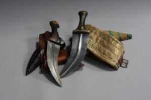 Two small Arabic daggers.