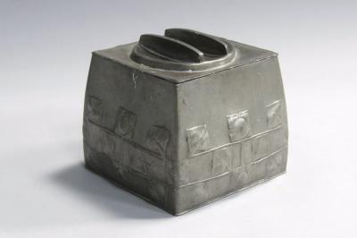 A Liberty & Co pewter biscuit box and cover