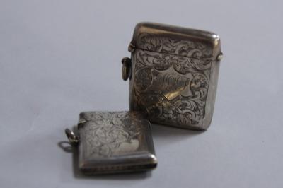 Two silver vesta cases