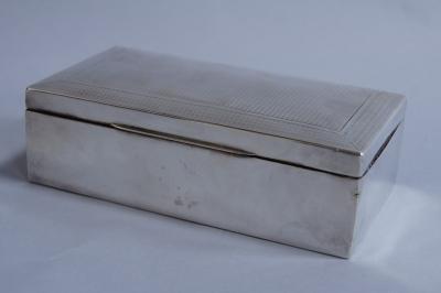 A George VI silver cigarette box