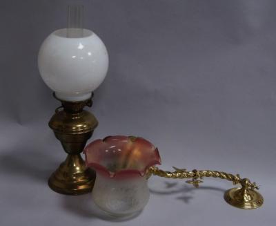 A Victorian twist brass wall sconce