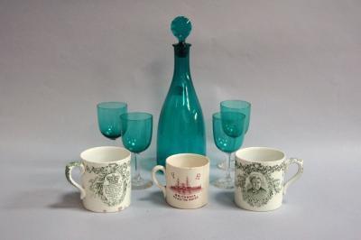 A Victorian green glass mallet decanter