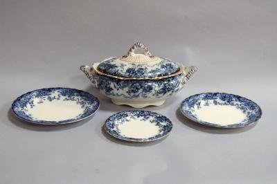 An extensive Victorian flow blue dinner service in the Chatsworth pattern