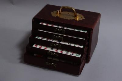 A modern Mah-Jong set in case.