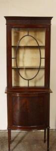 An Edwardian mahogany glazed display cabinet.